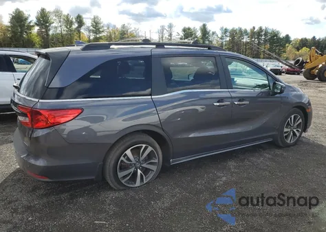 2022 Honda Odyssey Touring z USA, uszkodzony, nr VIN 5FNRL6H83NB027682